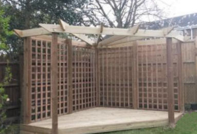 Copyright image: Chris's fantastic corner pergola made from the plans.